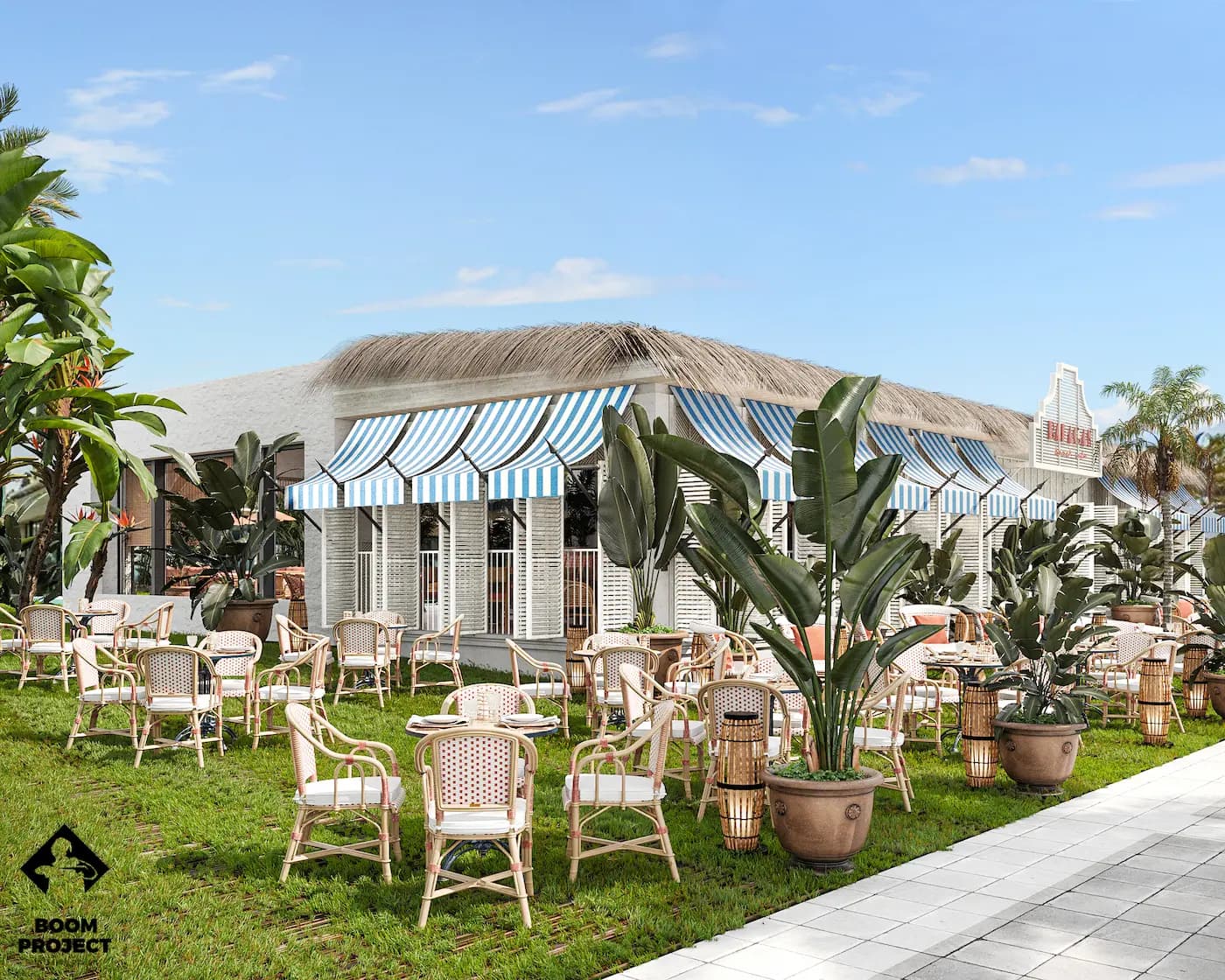 Balagan garden dining area with white furniture and tropical planting