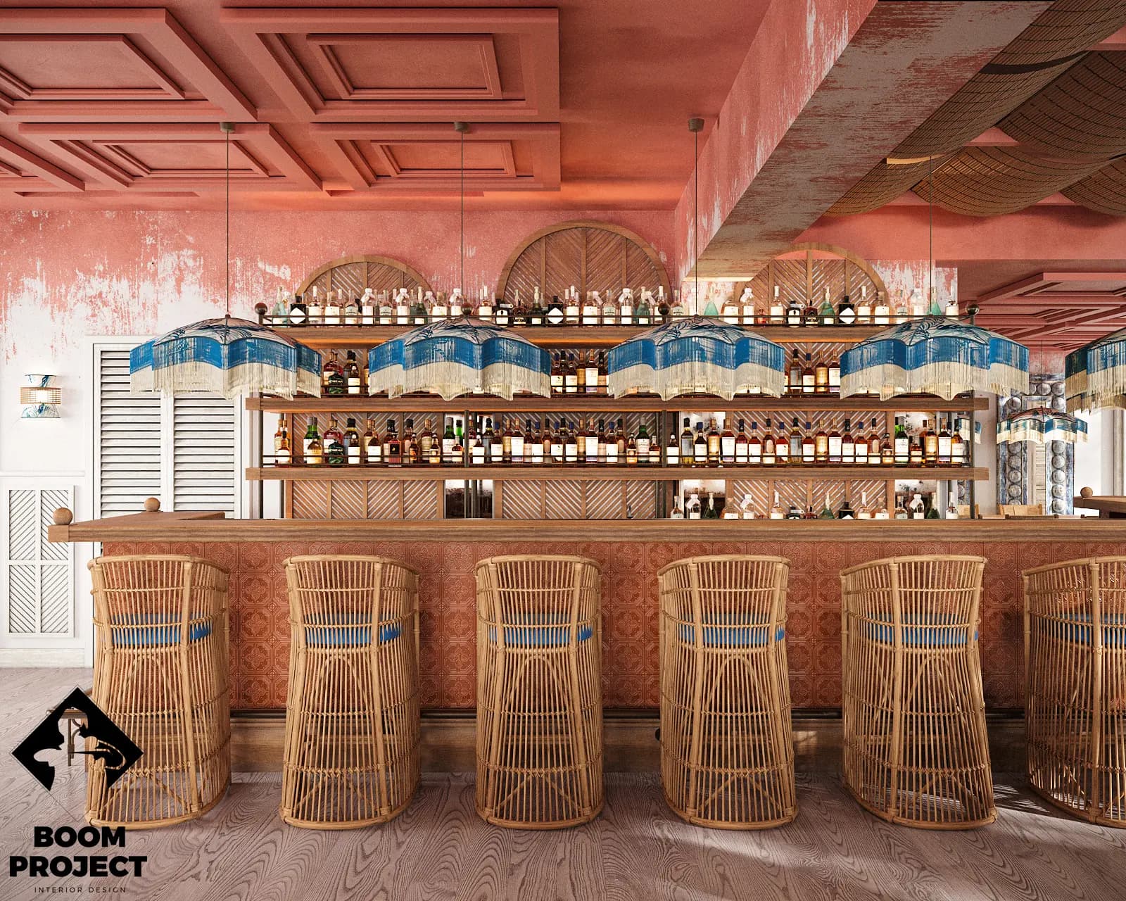 Balagan beach club bar in Marbella with carved timber panels, patterned tiles and a coral-painted ceiling