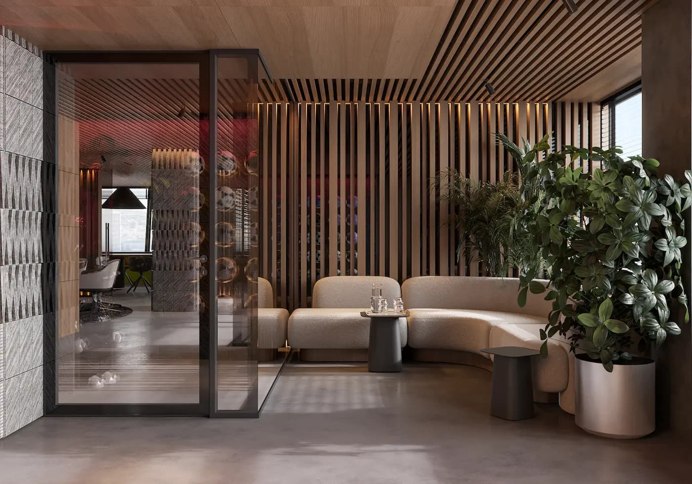 Curved lounge seating framed by timber screens and indoor planting