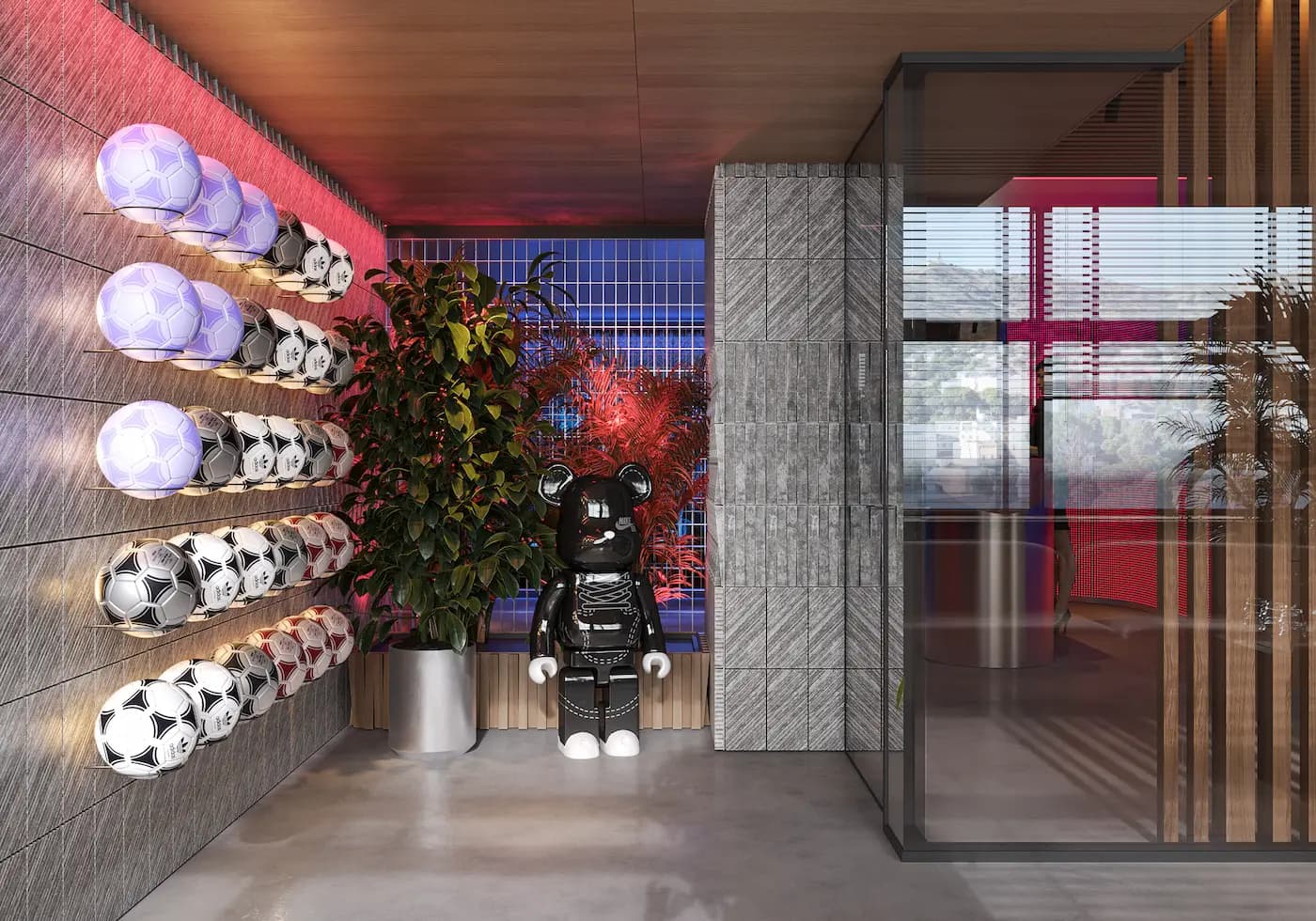 Decorative football display and illuminated artwork in the entrance area