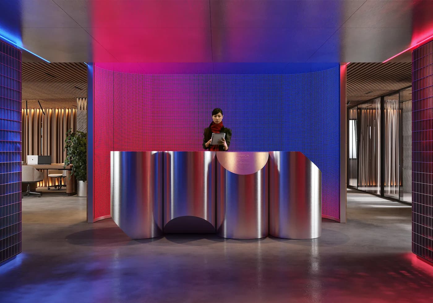 Interior of the BARÇA Mobile headquarters in Barcelona, featuring sculptural lighting, branded colours and custom-designed workspaces.