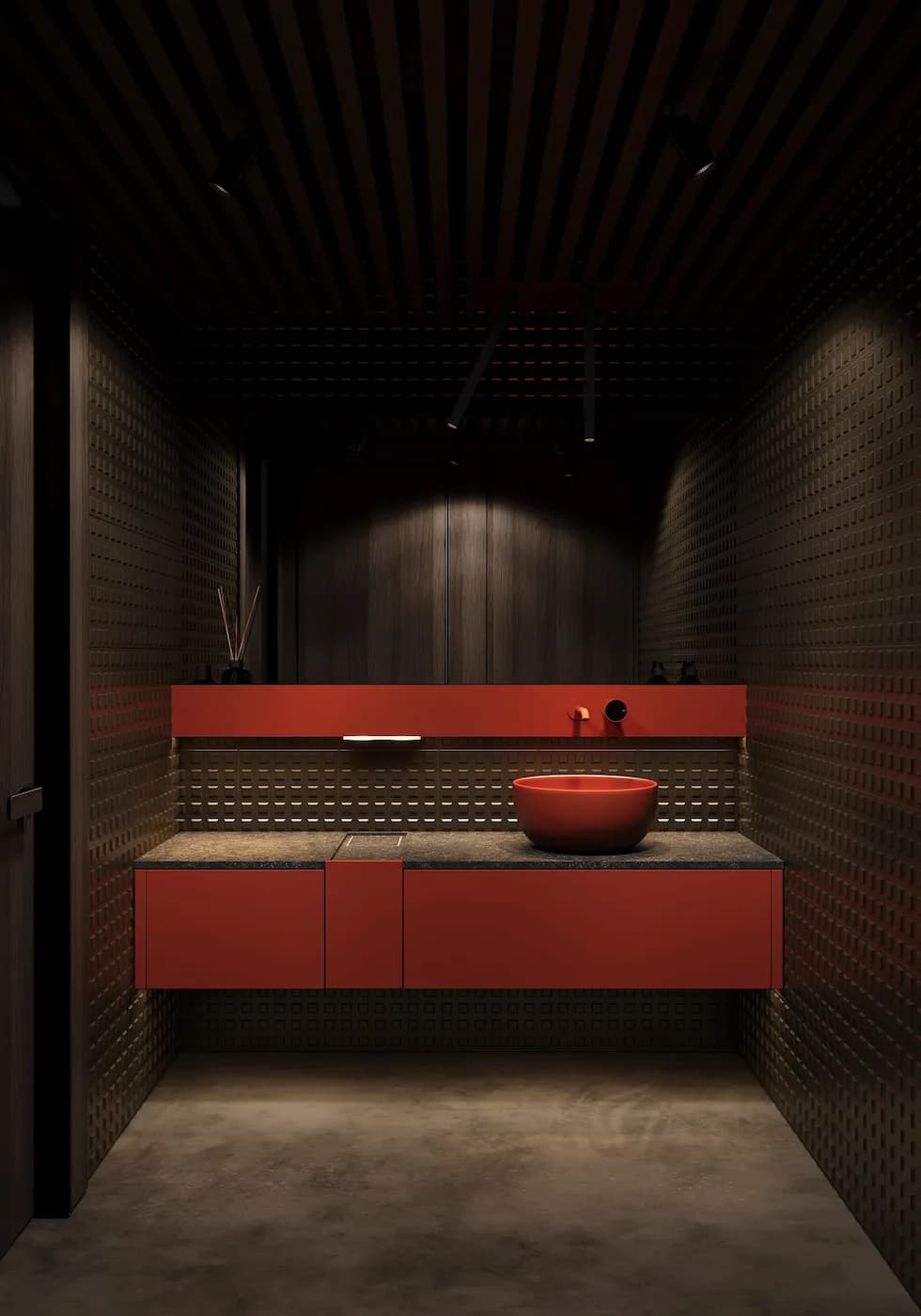 BARÇA Mobile restroom with red vanity, sculptural basin and dark textured finishes