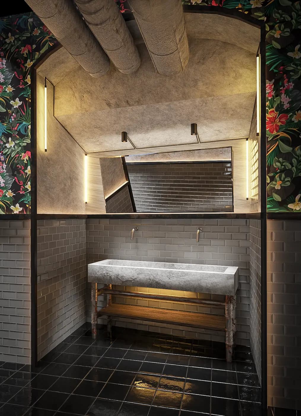 Sculptural stone washbasin set within a softly lit vanity niche