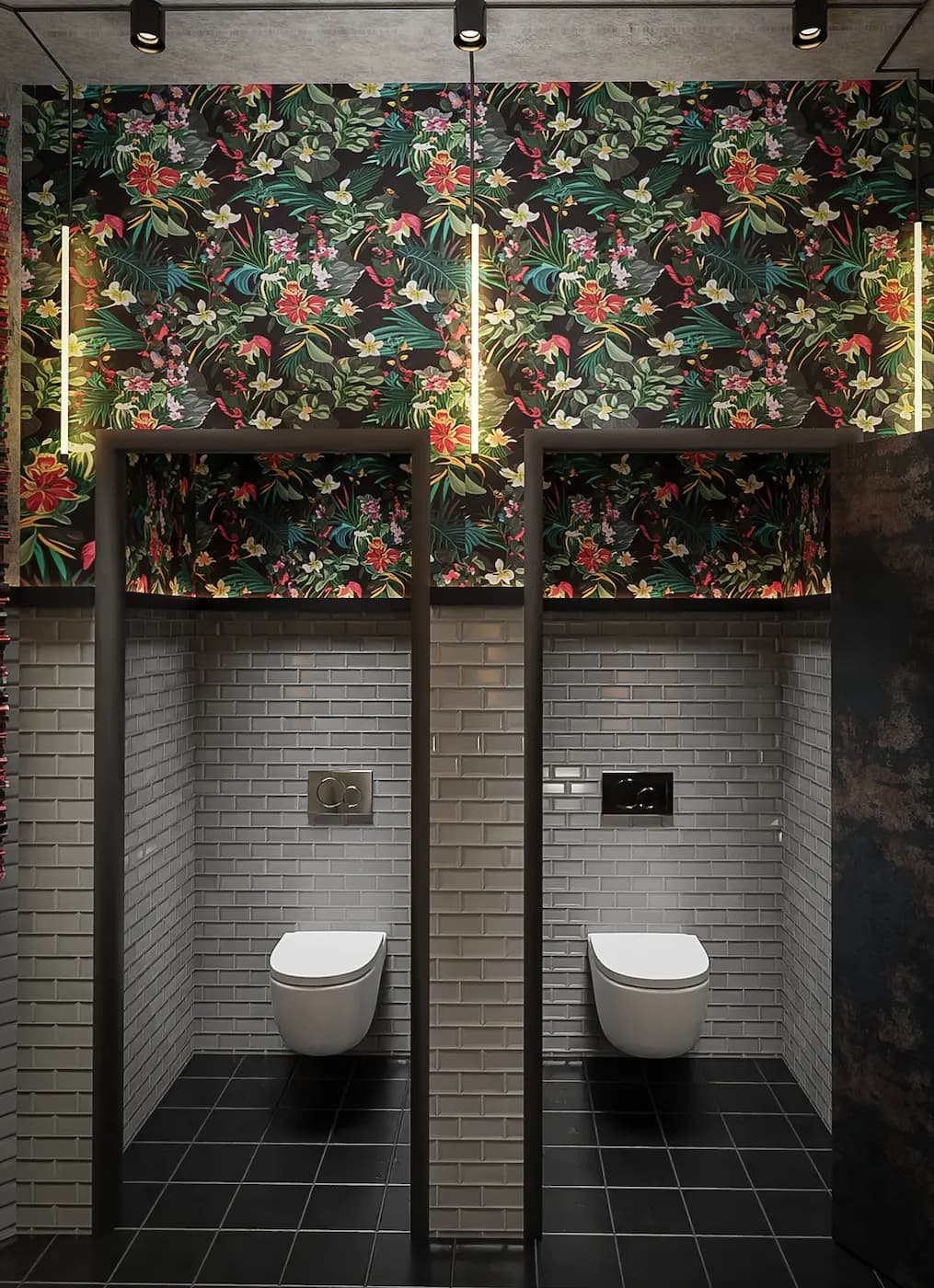 Restroom cubicles beneath an illuminated floral ceiling