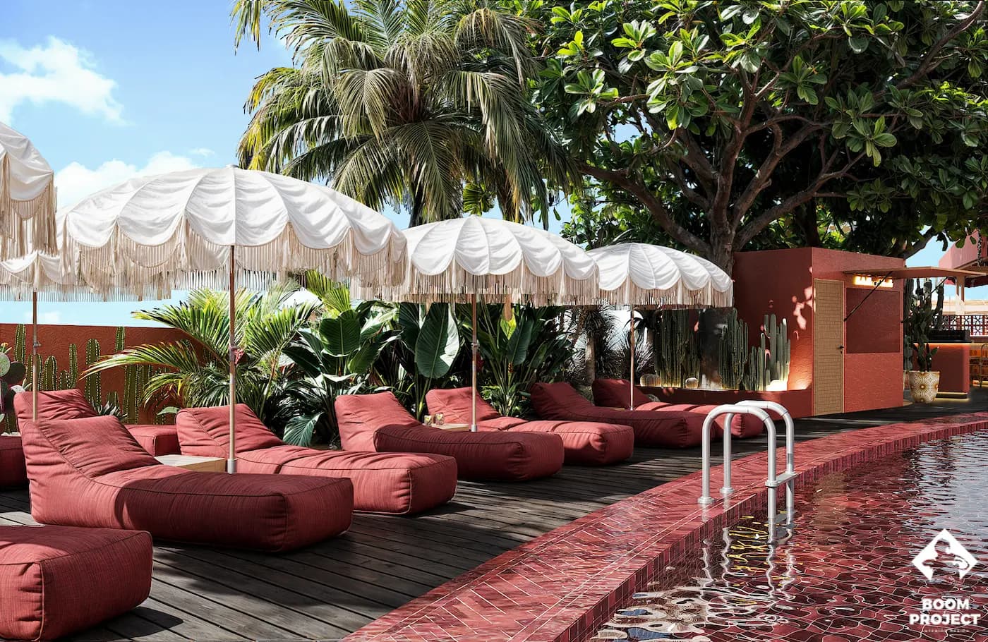 Garden lounge with red seating beneath trees and white fringed parasols