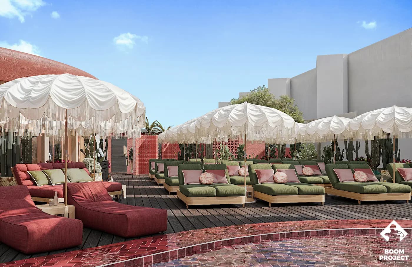 Garden lounge with red sofas and white fringed umbrellas