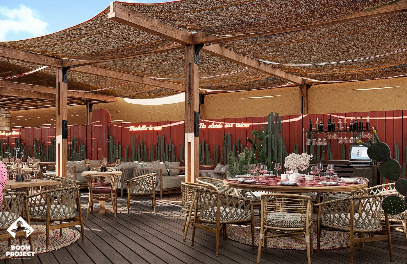 Layered restaurant seating with patterned textiles and warm ambient light