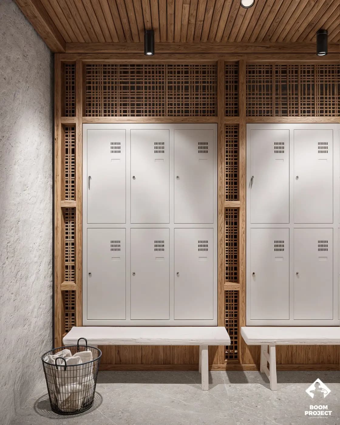 Restroom cubicles with white doors and woven timber partitions
