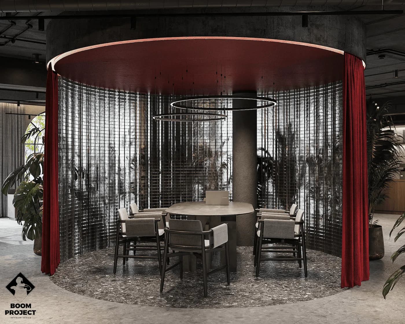 Glass meeting room beneath a suspended red acoustic ceiling feature