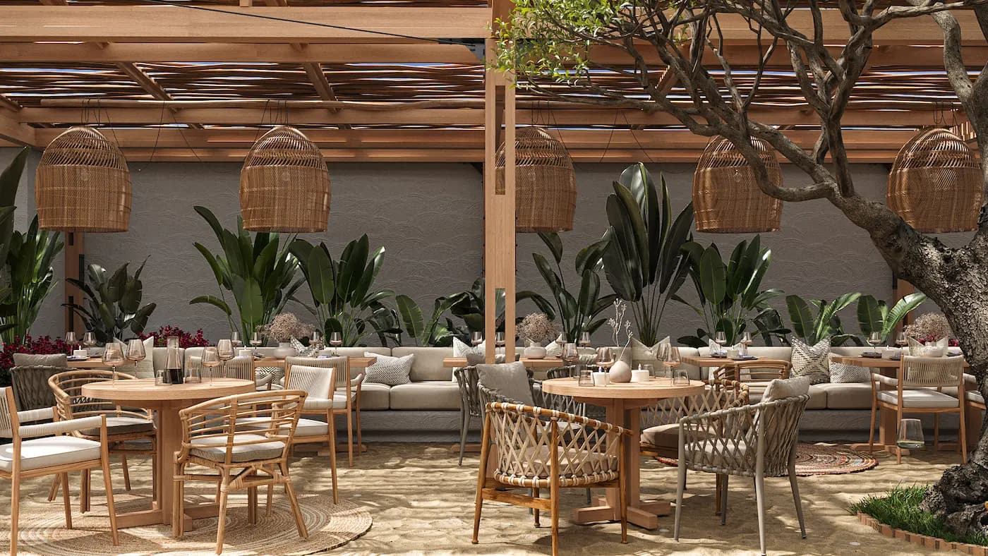 Open-air dining terrace beneath a timber pergola with woven pendant lights
