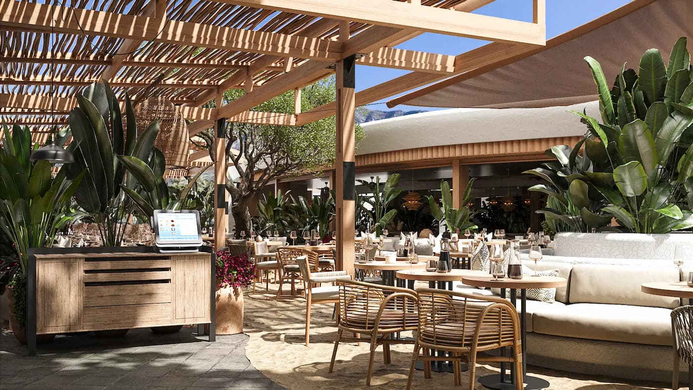 Shaded dining terrace with timber tables beneath stretched fabric canopies