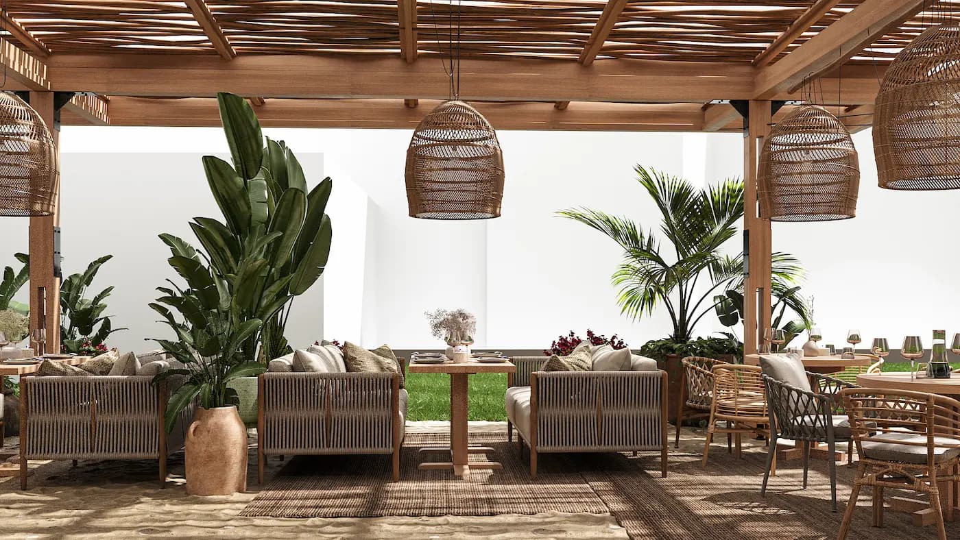 Intimate lounge with woven furniture, patterned rug and sculptural pendant light