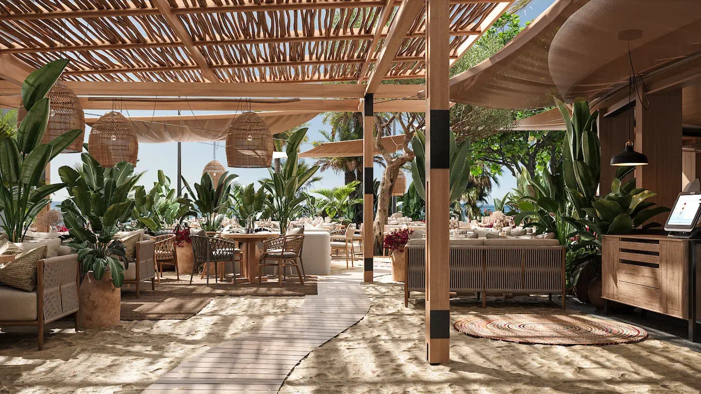 Open-air dining area beneath timber beams and filtered natural light