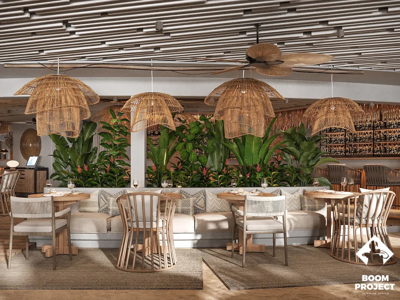 Covered dining area with pale furniture and decorative ceiling elements