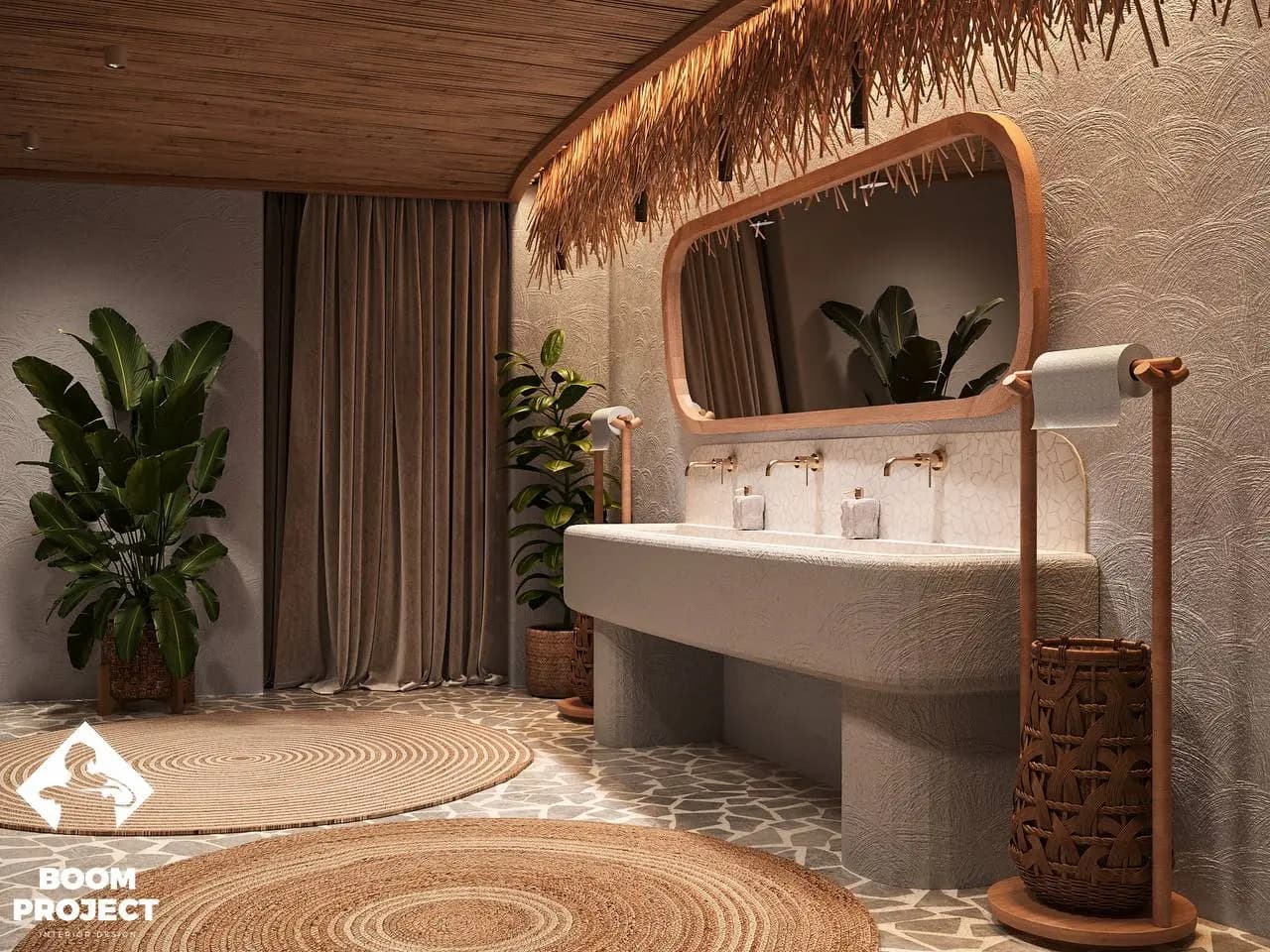Stone washbasin beneath an organically shaped illuminated mirror