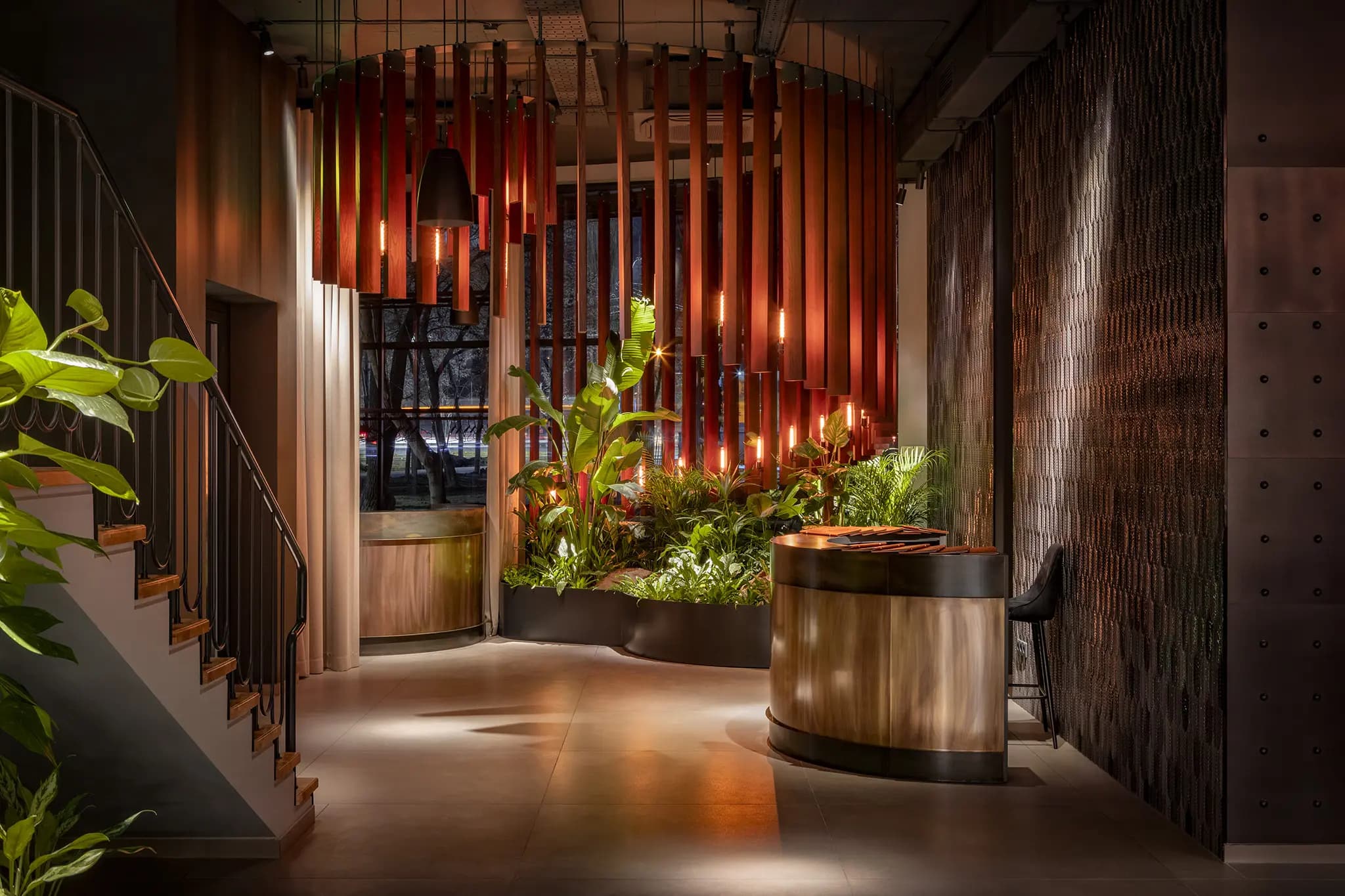Entrance with timber façade and landscaped greenery