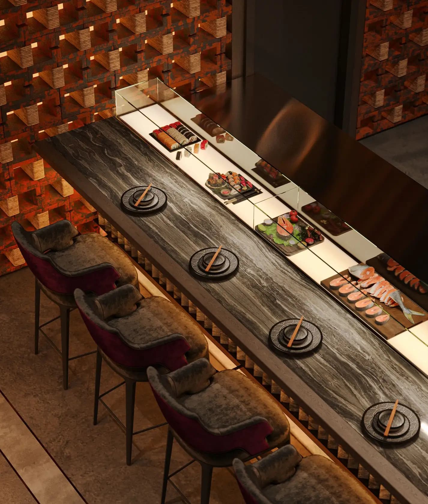 Overhead view of the Zaxi Restaurant sushi counter with a textured timber surface and patterned pendant lights