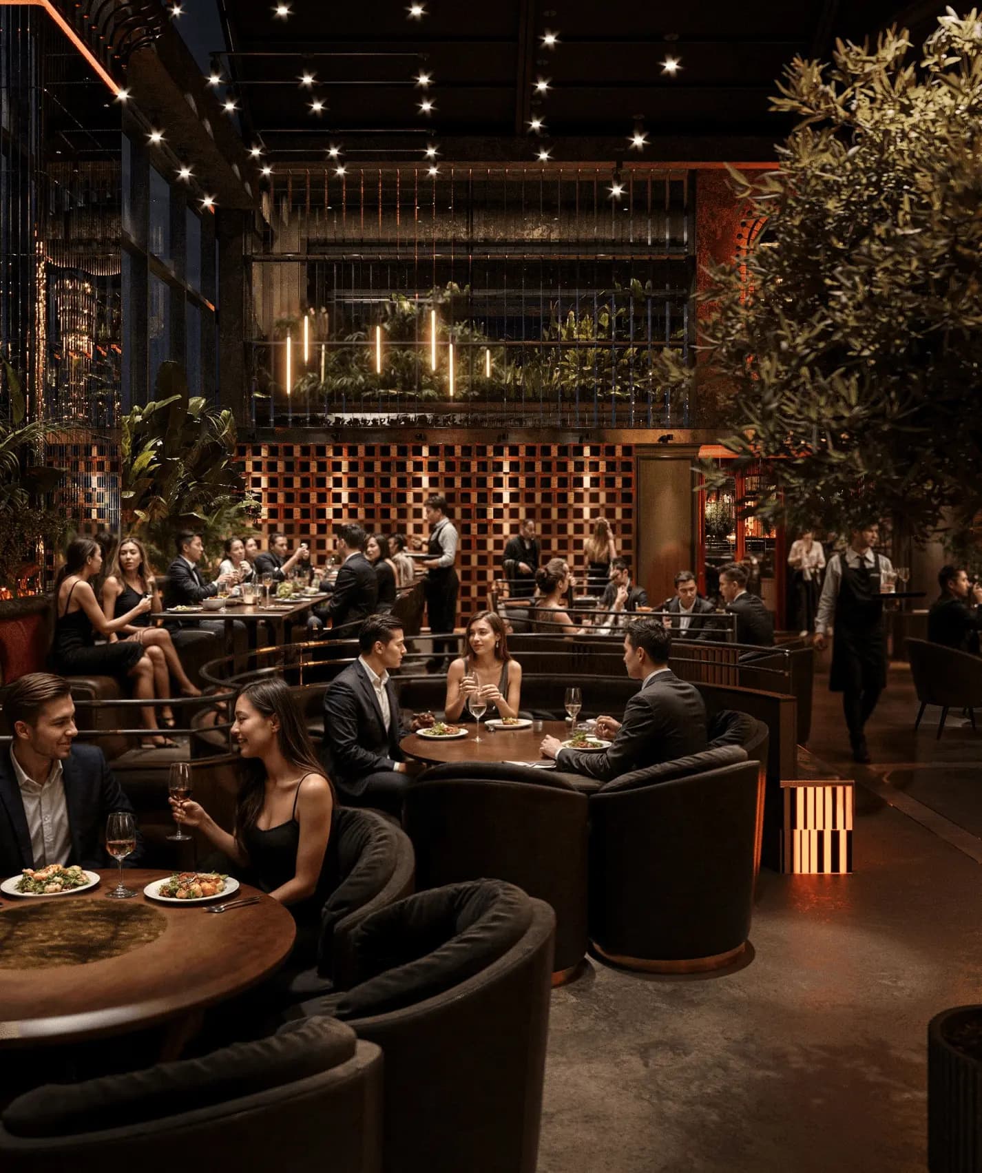 String-lit round booth seating at Zaxi Restaurant framed by floor-to-ceiling windows