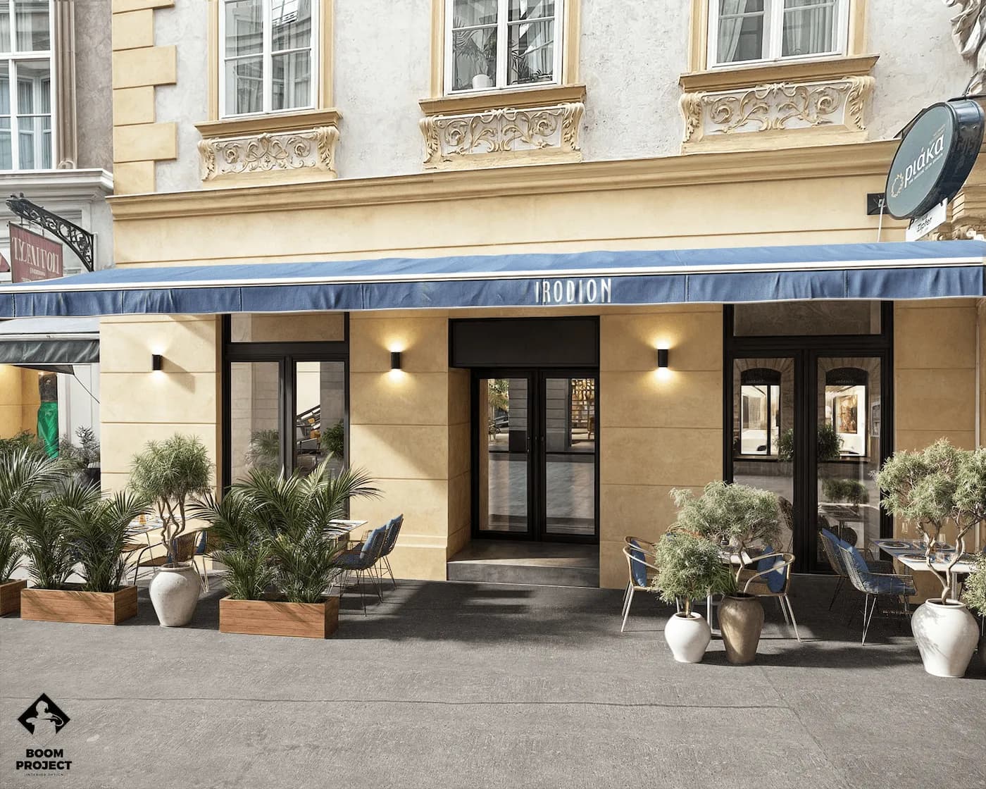 Irodion restaurant facade in Vienna with outdoor planting, terrace seating and branded entrance