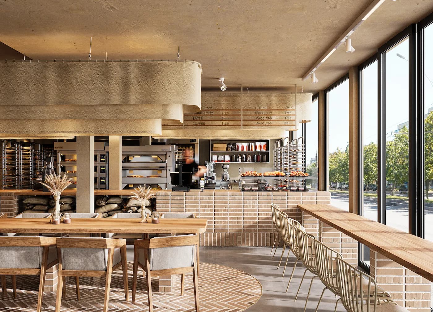 Bakery dining area with natural timber furniture, textured walls and open production views
