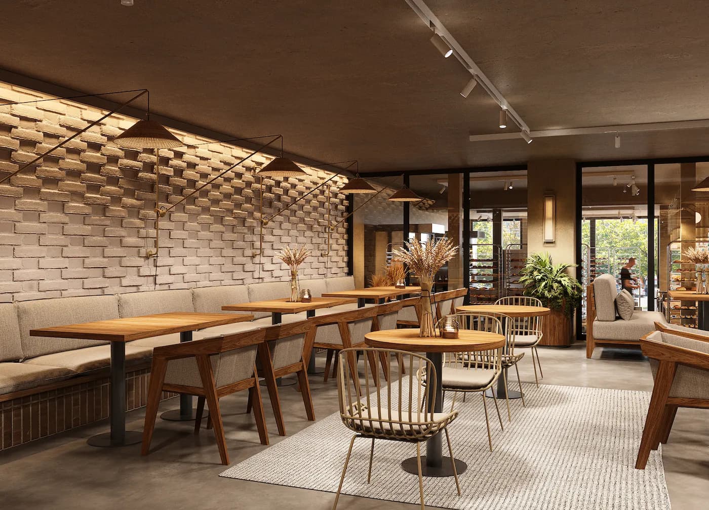 Intimate bakery lounge with upholstered seating, warm wall lights and dark timber finishes