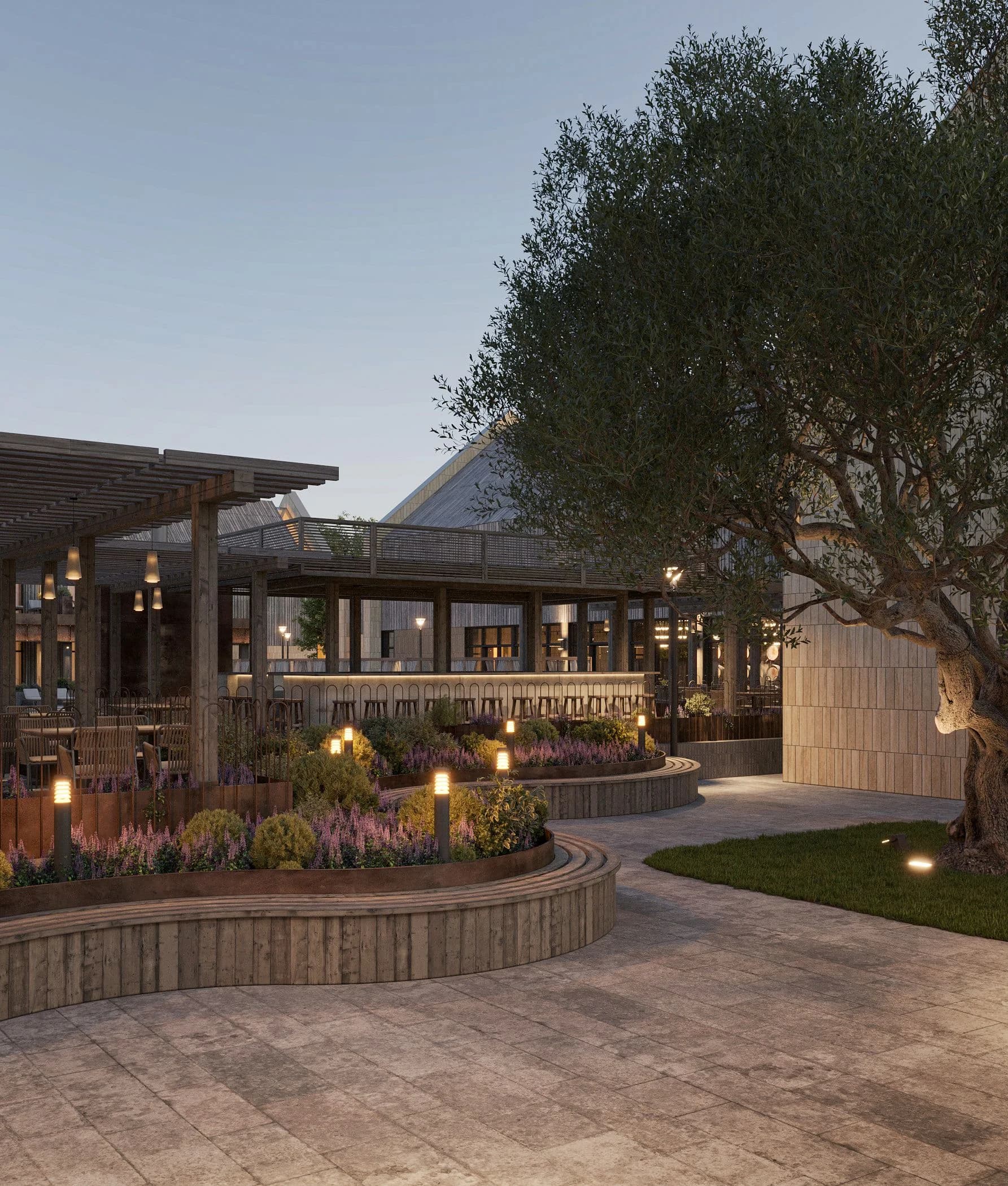 Open-air terrace with dining tables under a pergola and warm lighting