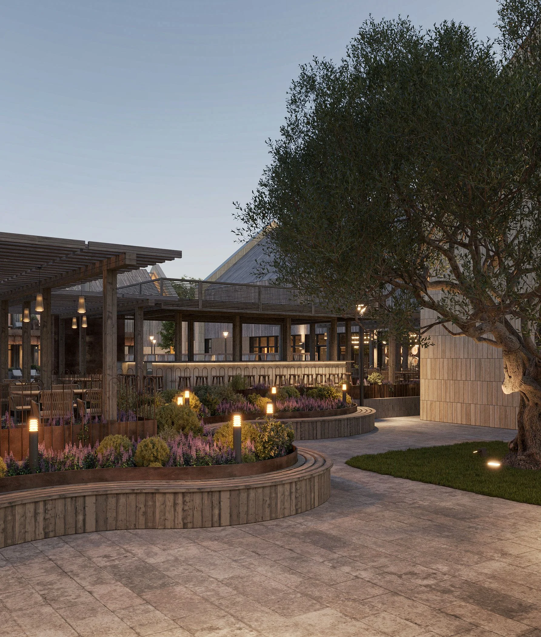 Open-air terrace with dining tables under a pergola and warm lighting
